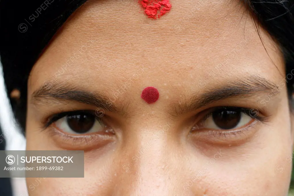 Tika on a Hindu woman's forehead