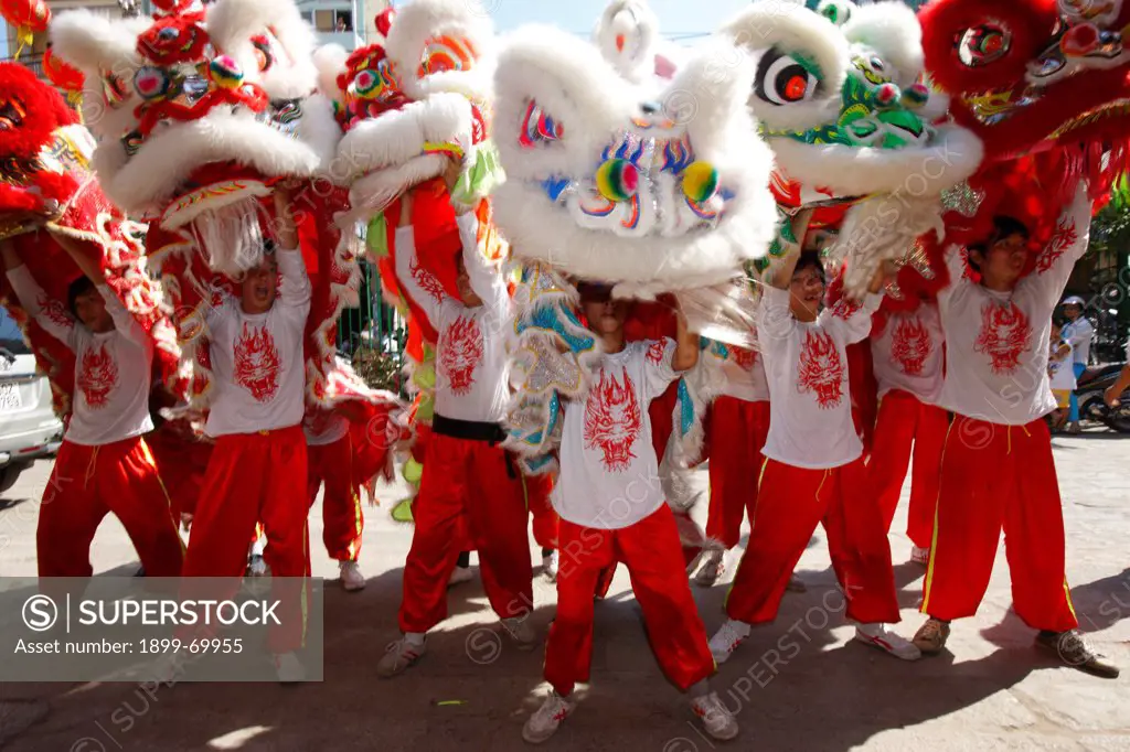 Quan Am Pagoda. Chinese New Year. Lion dance performers.