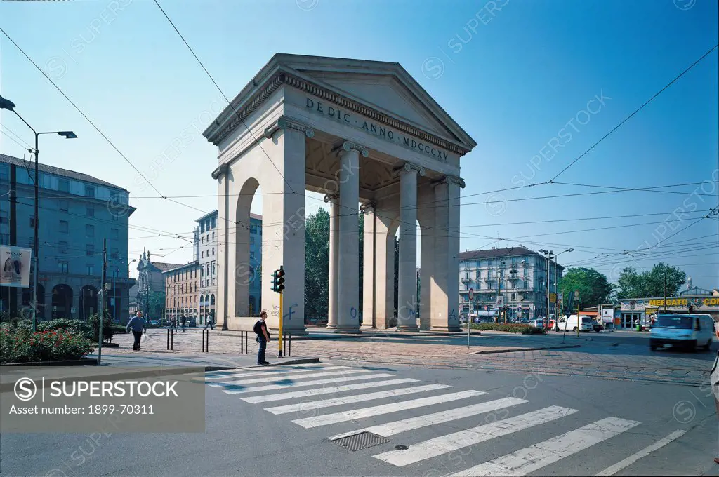 Italy, Lombardy, Milan. Whole artwork view. A view of Porta Ticinese with its tympanum, frieze, pediment and columns.