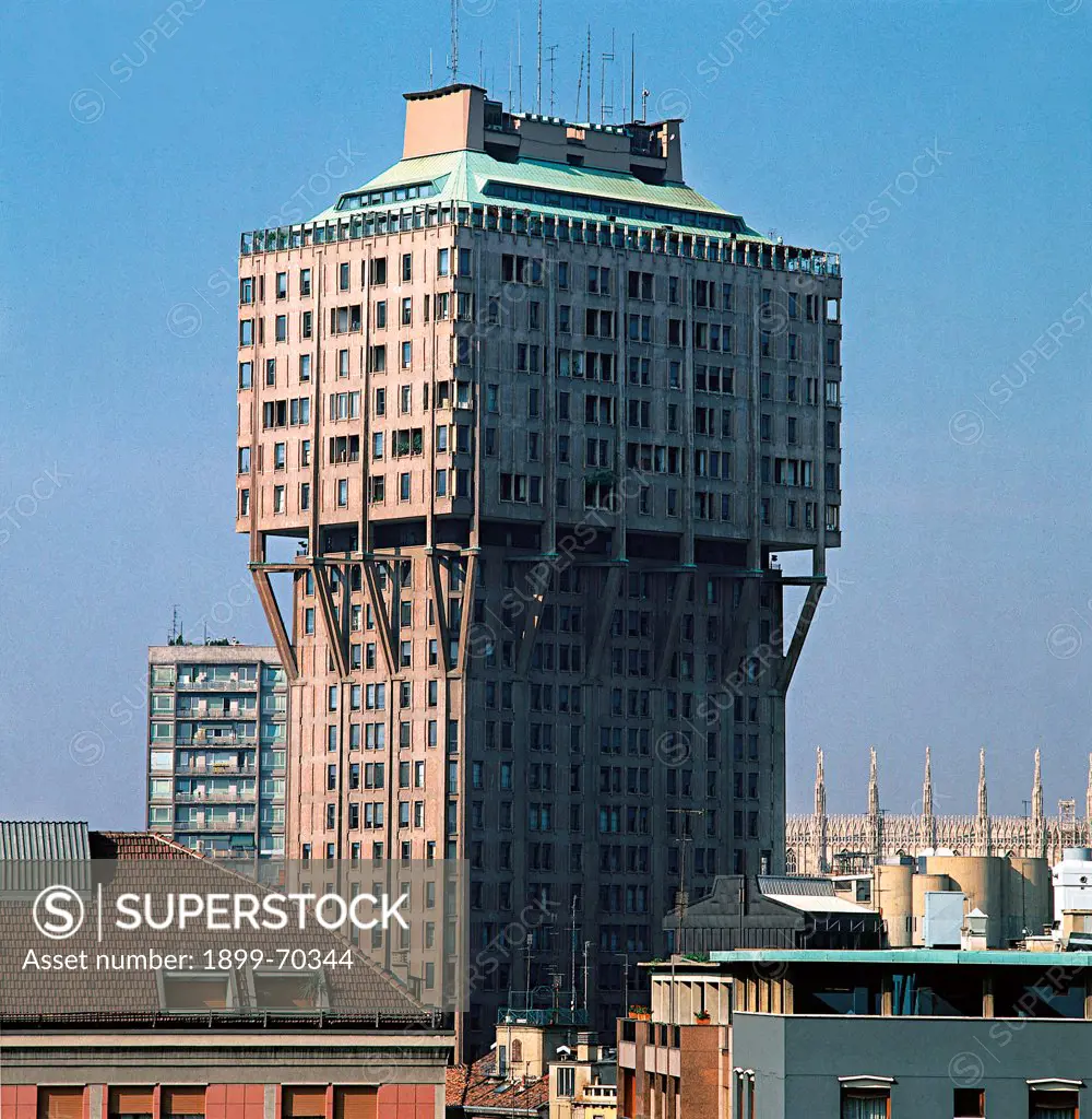Italy, Lombardy, Milan, Velasca Tower. View of the upper part of the tower block Torre Velasca from a balcony.