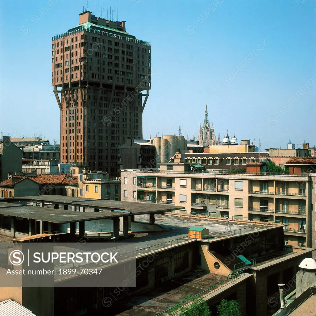 Italy, Lombardy, Milan, Velasca Tower. View of the tower block from a balcony. The tower is visible as well as other buildings.