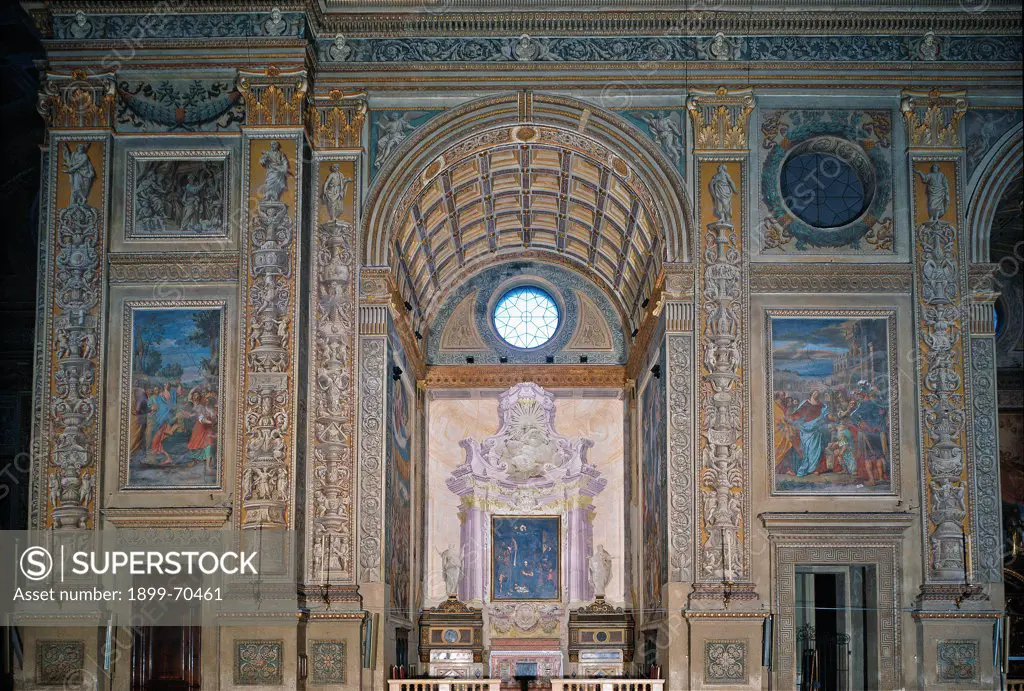 Italy, Lombardy, Mantua. Detail. The alternate rhythm of the decorative order by pillars and chapels along the side of the nave. In the centre a coffered barrel vault.