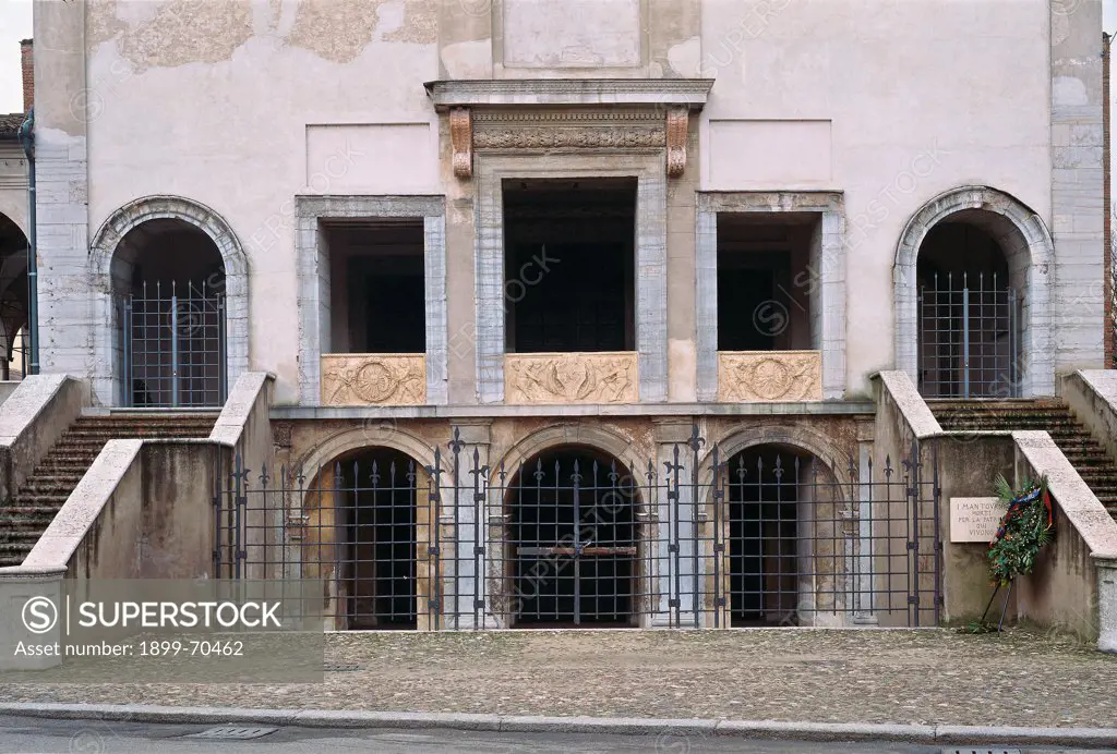Italy, Lombardy, Mantua. Detail. Front view of the lower part of the facade with the arches of the entrance to the crypt.