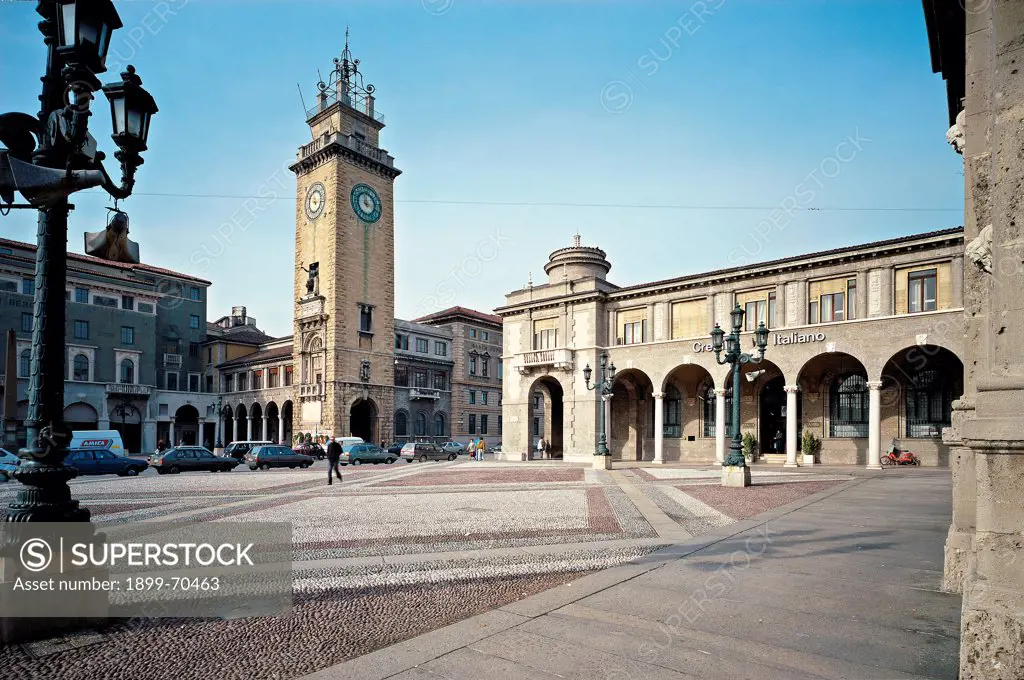 Italy, Lombardy, Bergamo. Detail. View of the portico and the clocktower.