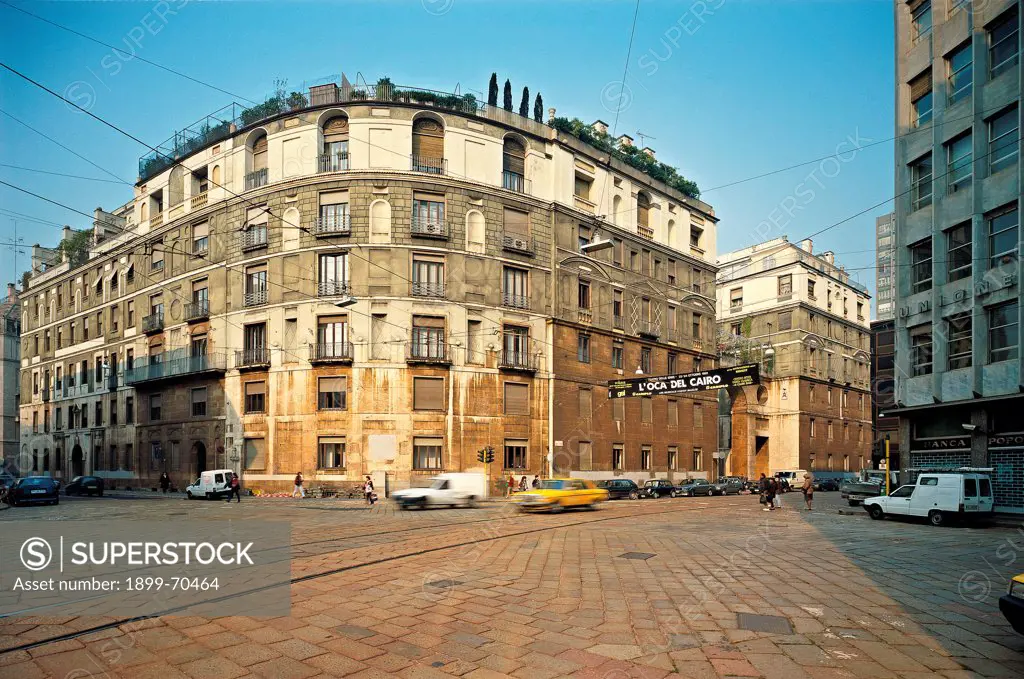 Italy, Lombardy, Milan, United States square. Whole artwork view. An external and angular view of the palace and the street in front of it.