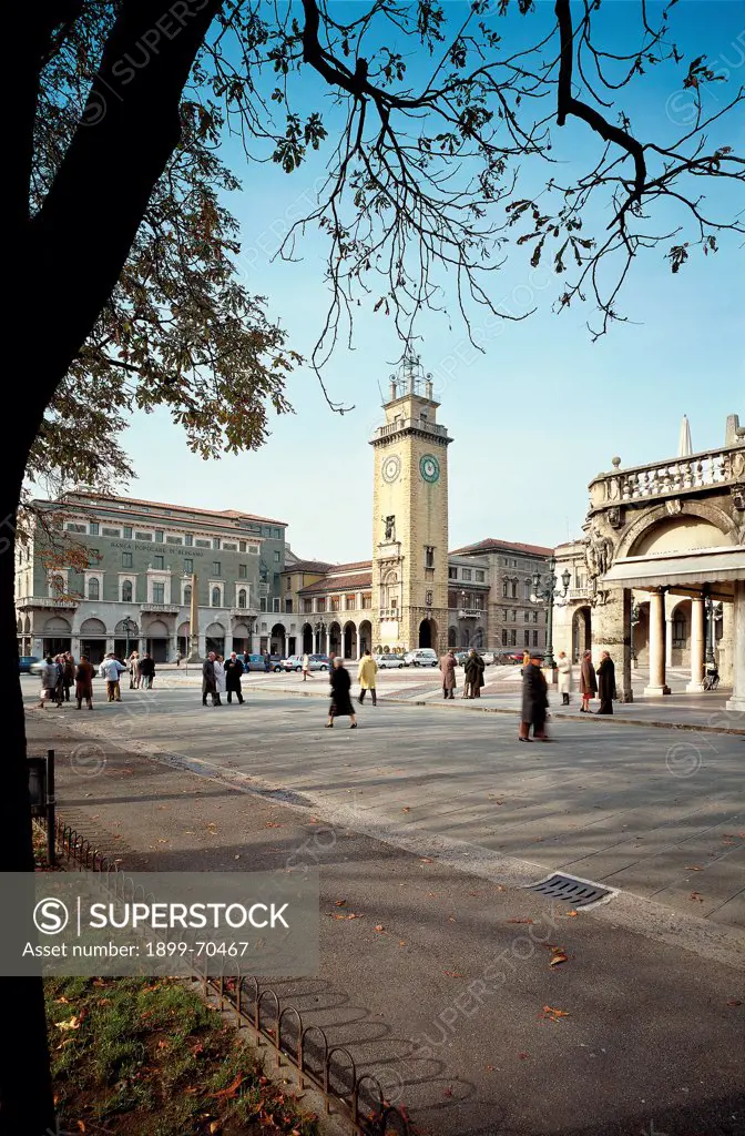 Italy, Lombardy, Bergamo, Piazza Vittorio Veneto. Detail. View of the square that presents a portico, the clocktower and Banca Popolare di Bergamo.