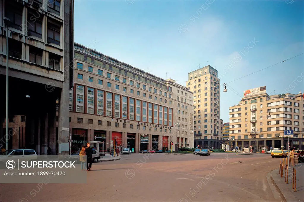 Italy, Lombardy, Milan. Detail. View of the square with buildings and porticos.