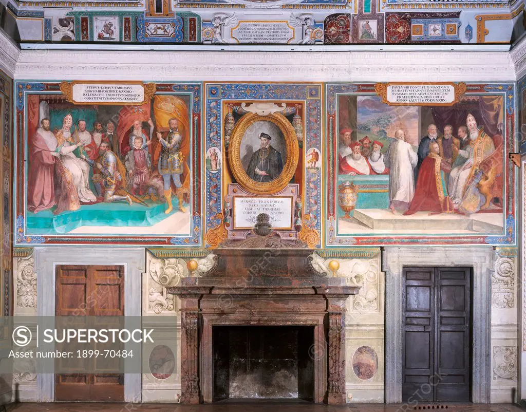 Italy, Lazio, Caprarola (Viterbo), Palazzo Farnese. Detail. View of the wall, that is decorated with frescoes, where is located the fireplace.
