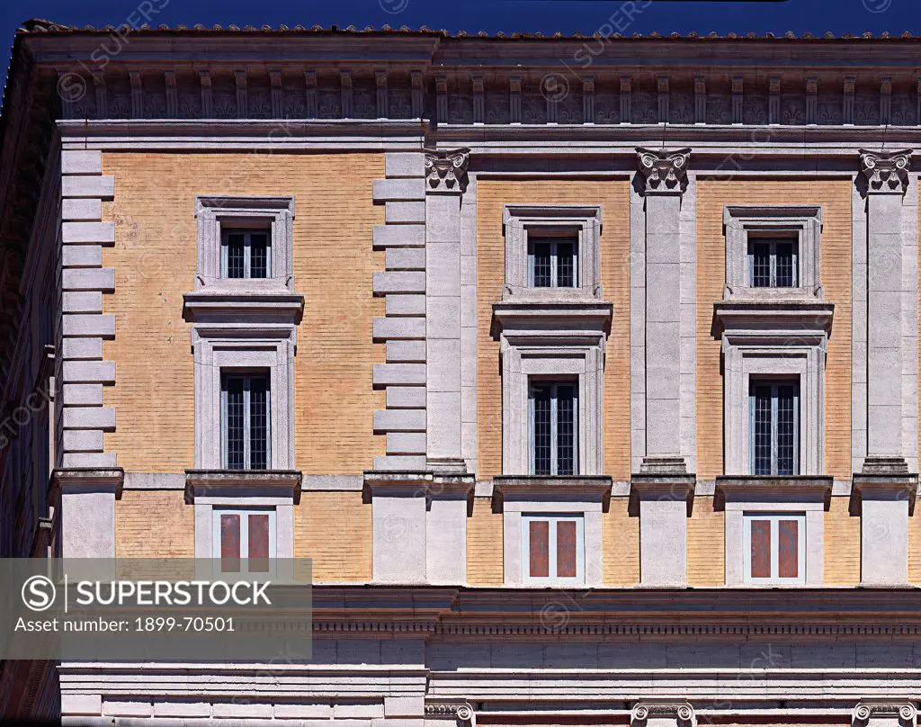 Italy, Lazio, Caprarola (Viterbo), Villa Farnese. Detail. View of the second and third floor of the facade, with angular smooth rustication and Ionic pilasters.