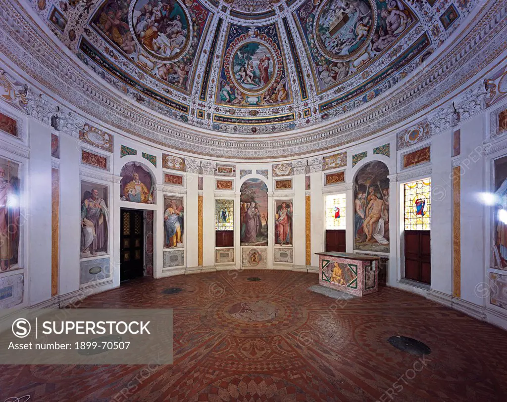 Italy, Lazio, Caprarola (Viterbo), Villa Farnese. Detail. View of the circular plan chapel, with perimeter walls and dome entirely frescoed; the floor is a marble mosaic work, it presents geometrical patterns arranged in a radial way.