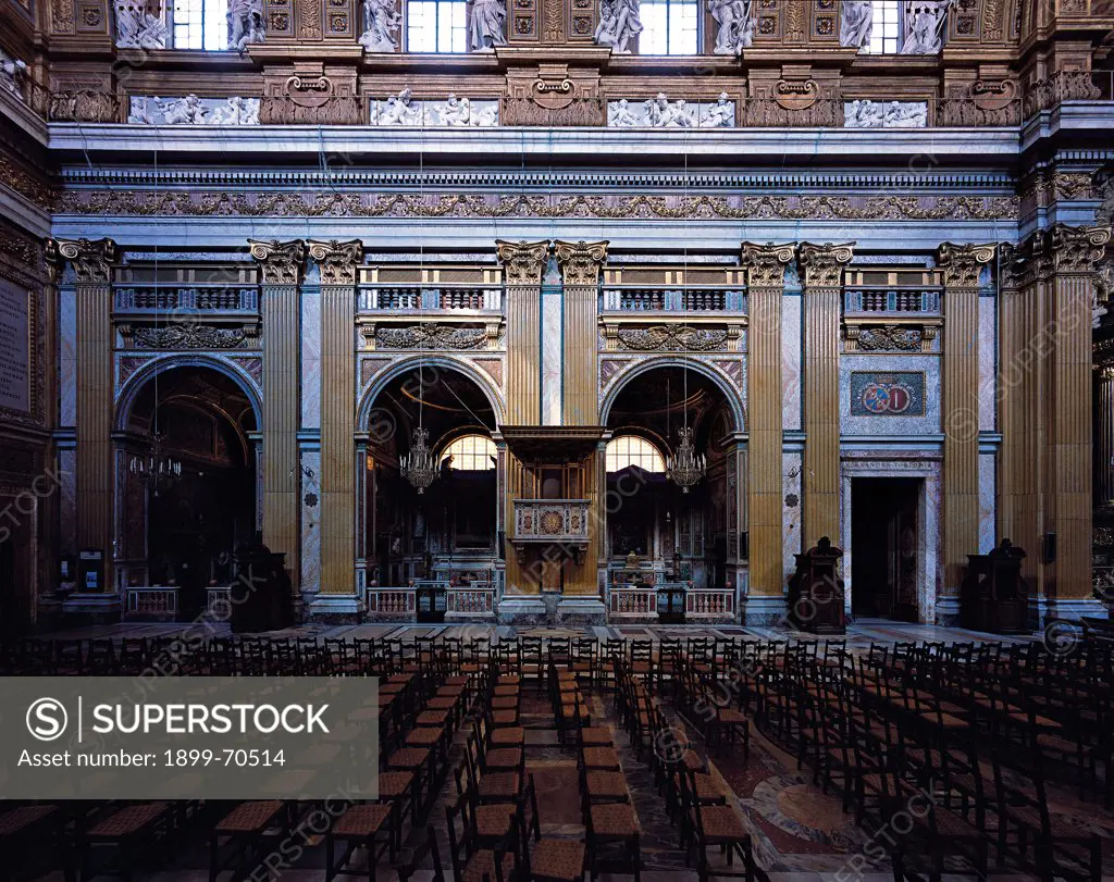 Italy, Lazio, Rome, Church of the Gesù. Detail. View of the side of the nave marked with fluted pilasters: between them some round arches open out.