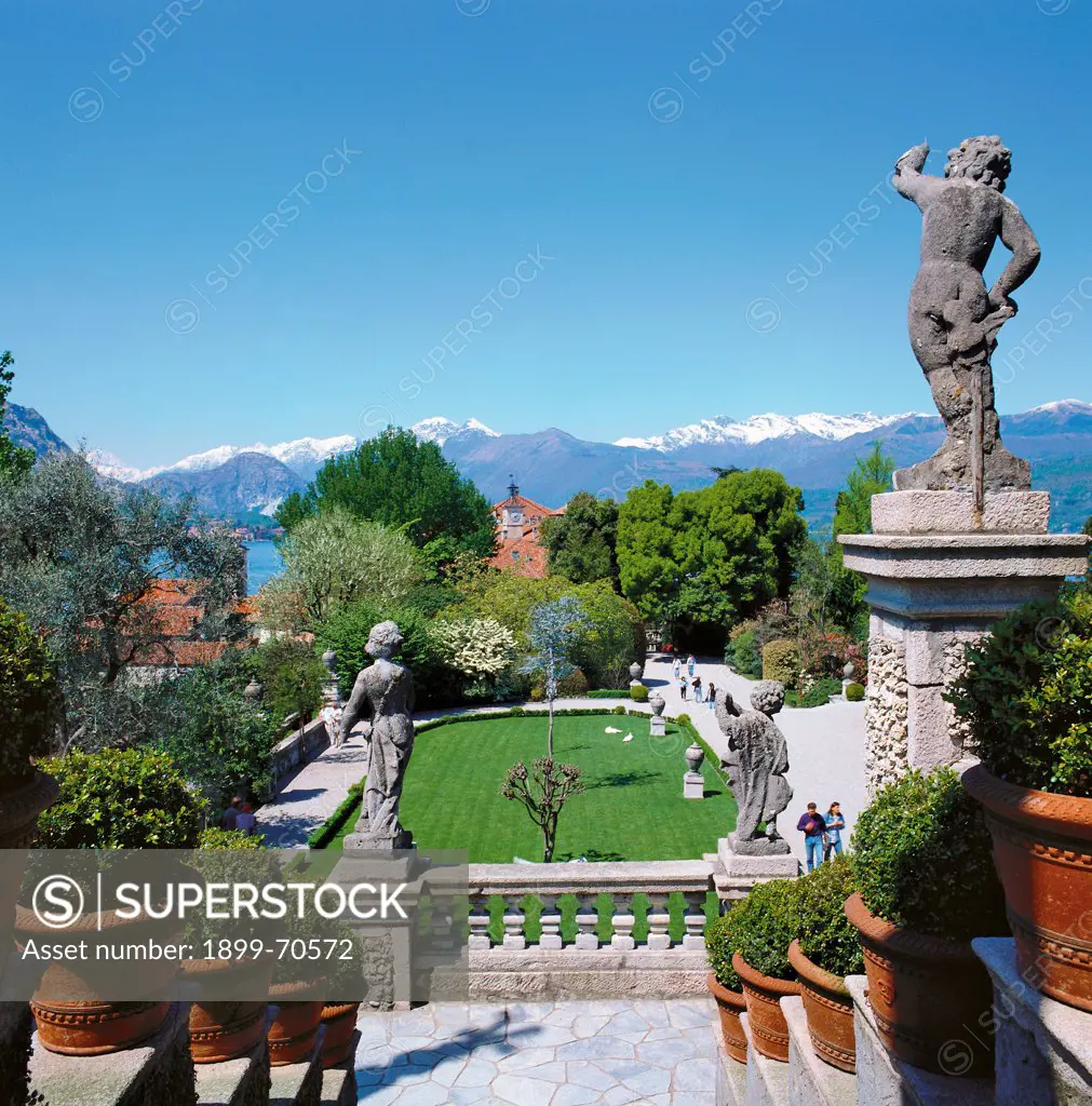 Italy, Lombardy, Isola Bella, Borromeo Gardens. Detail. View from the terraces adorned with statues. Below it a flowerbed of the parterre.
