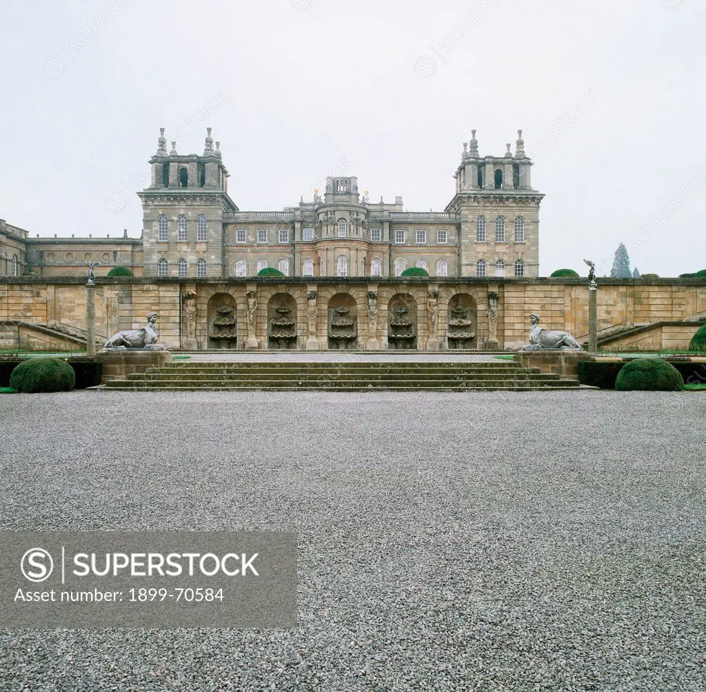 United Kingdom, Oxfordshire, Woodstock, Blenheim Palace. Detail. The parterre of the gardens on more levels. The access flight of steps to the nymphaeum guarded by two Sphinxes.