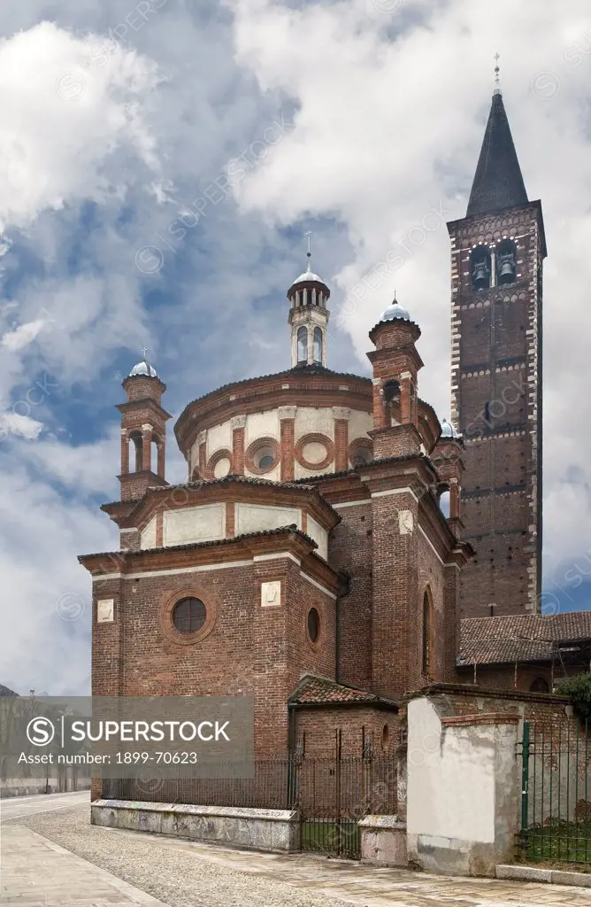 Italy, Lombardy, Milan, Basilica di Sant'Eustorgio. Whole artwork view. Outer view of the Portinari Chapel (Cappella Portinari) and of the bell tower.