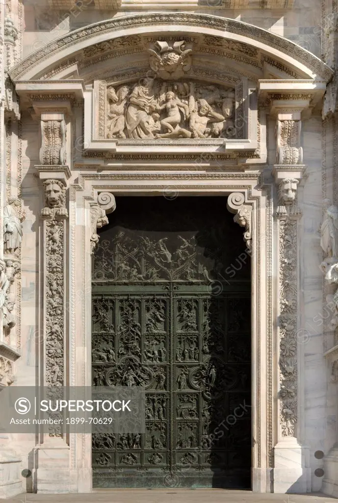 Italy, Lombardy, Milan, Duomo, Central Portal. Whole artwork view. Portal decorated with Virgin Mary's stories.