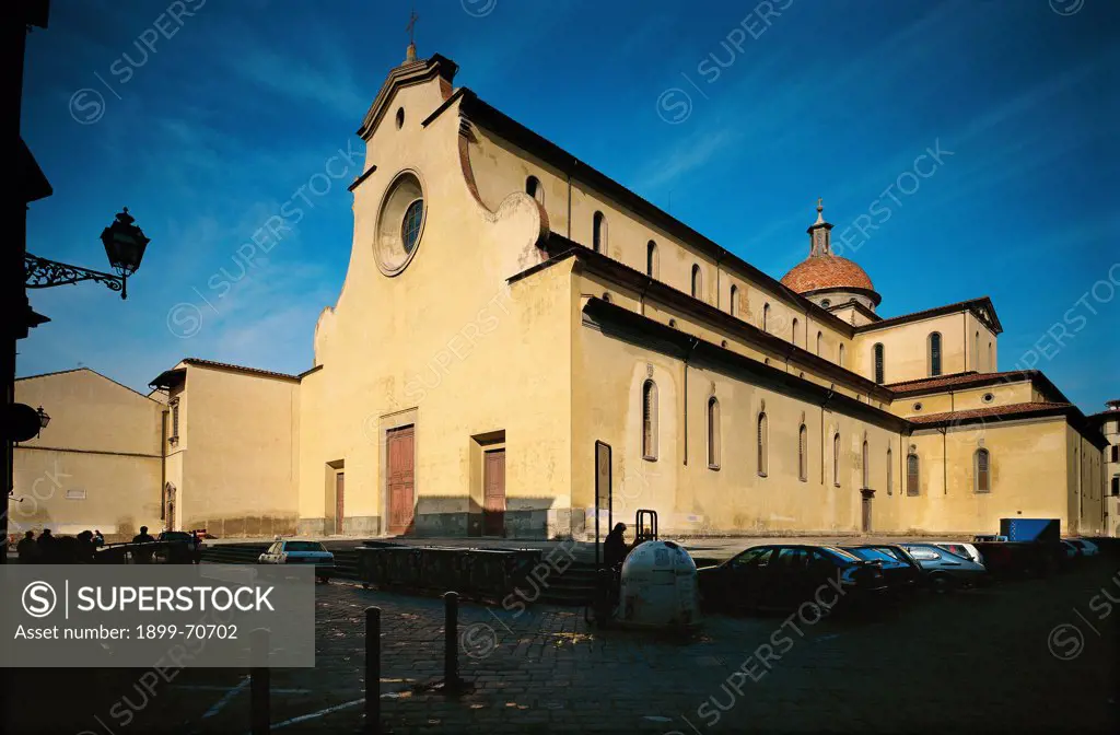 Italy, Tuscany, Florence, Santo Spirito Square. Whole artework view. A foreshortening view of the facade and of the right nave of the Church of Holy Spirit.