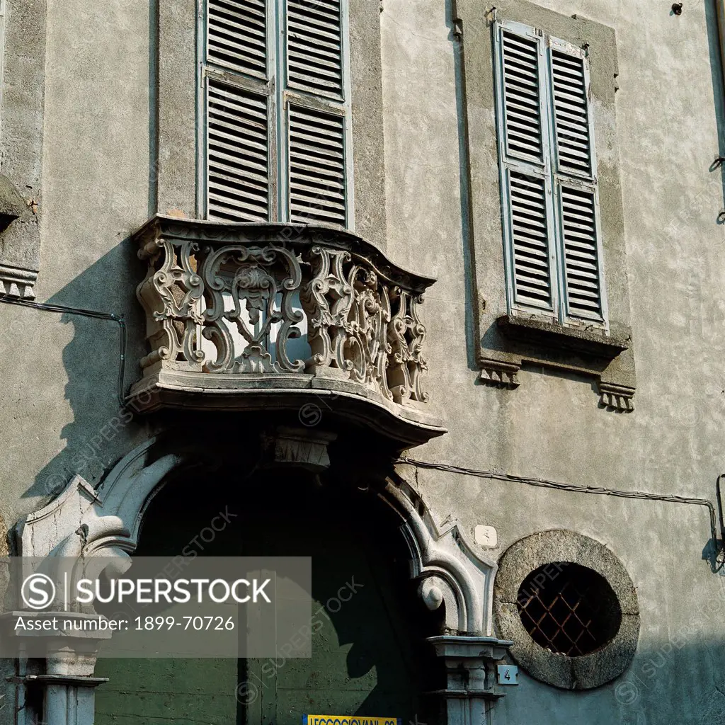 Italy, Lombardy, Lecco. Detail. The balustrade of the balcony placed upon the main entrance of the Secchi Palace.