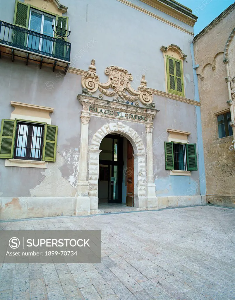 Italy, Basilicata, Matera, Vittorio Veneto Square. Detail. The eighteenth-century portal of a former Dominican convent with a rich baroque carved gable.