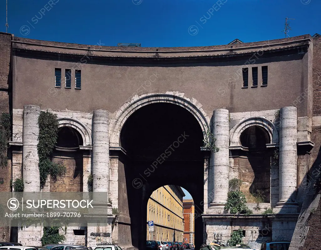 Italy, Lazio, Rome, Porta Santo Spirito. Whole artwork view. Frontal view of the gate, with concave front, triumphal arch and twin columns.