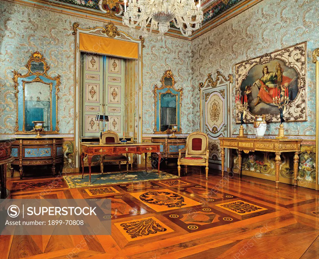 Italy, Piedmont, Chivasso, Torino, Villa Cimena. Detail. View of the hall boasting a rich parquet decoration and precious cabinets, including a desk, a square consolle and three round consolles; the walls host two mirrors with golden frames and a neoclassic painting, the vault is frescoed.