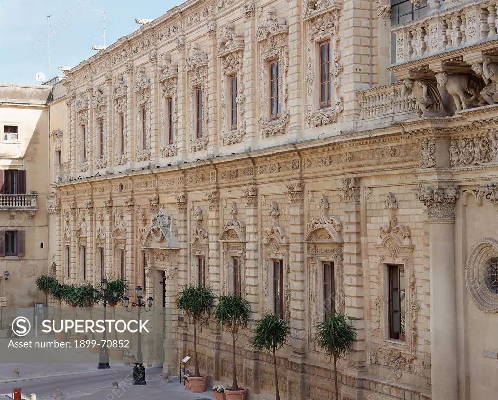 Italy, Puglia, Lecce. Detail. View of the facade of the monastery, decorated with pilasters, smooth rustication, decorated windows and string course.