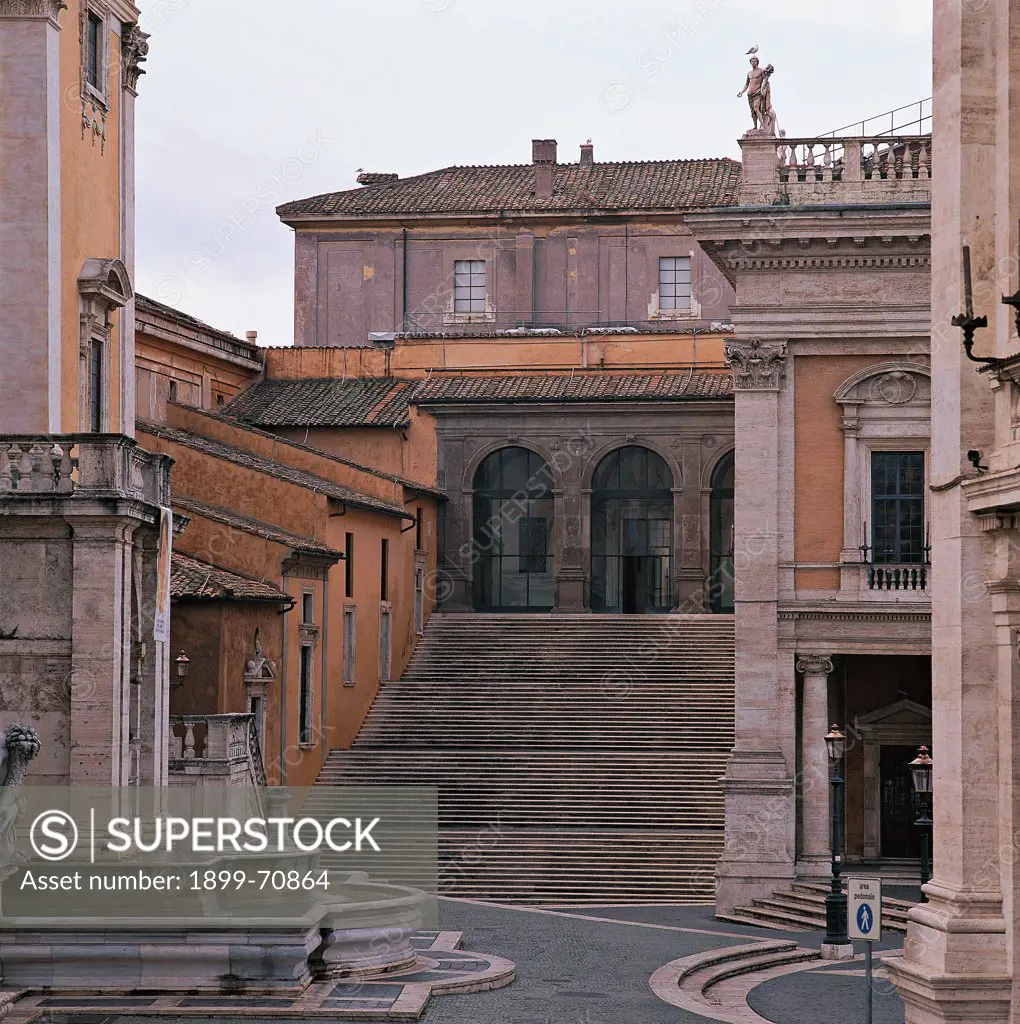 Italy, Rome (Rome), Palace of the Conservators. Detail. View of the loggia built with the peperino stone, a grey volcanic tuff occurring near Rome and Viterbo. All around the houses of the consulates.