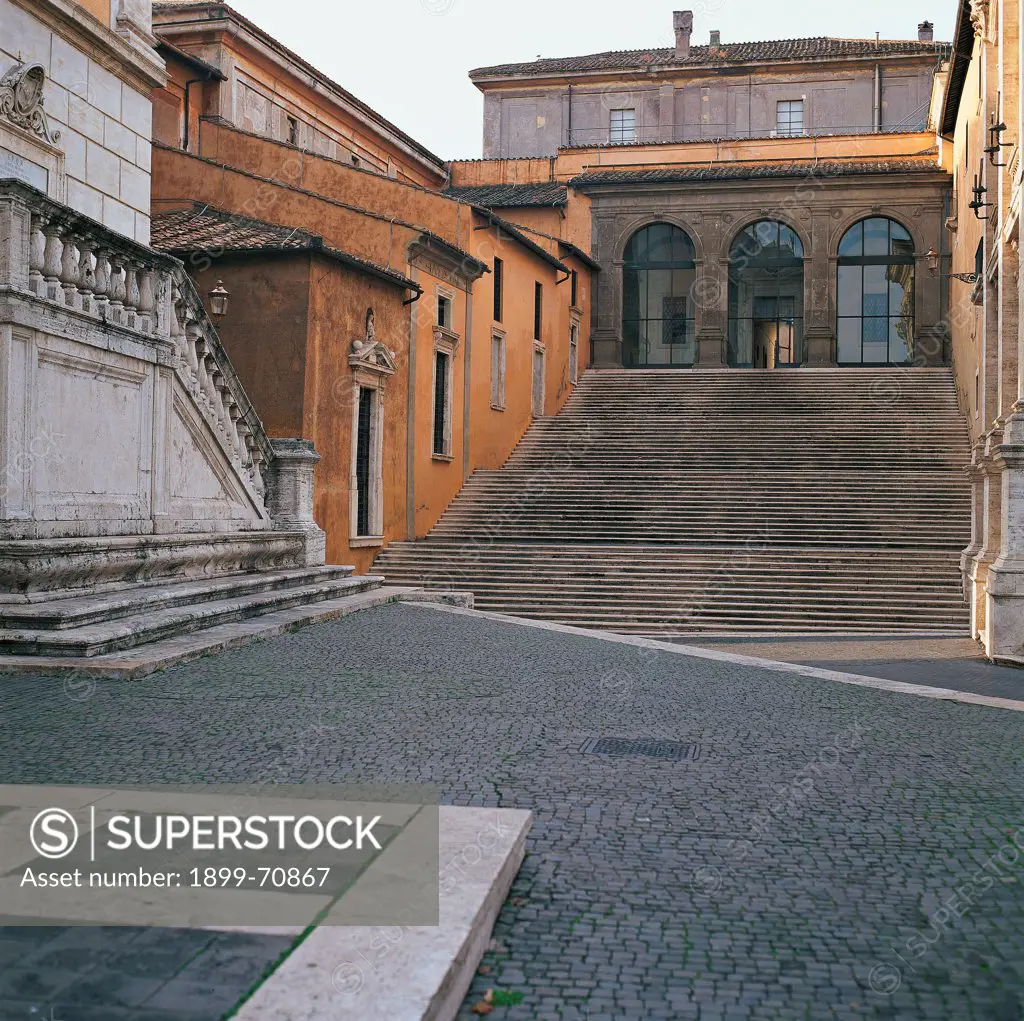 Italy, Rome (Rome), Palace of the Conservators. Detail. View of the loggia built with the peperino stone, a grey volcanic tuff occurring near Rome and Viterbo. All around the houses of the consulates.