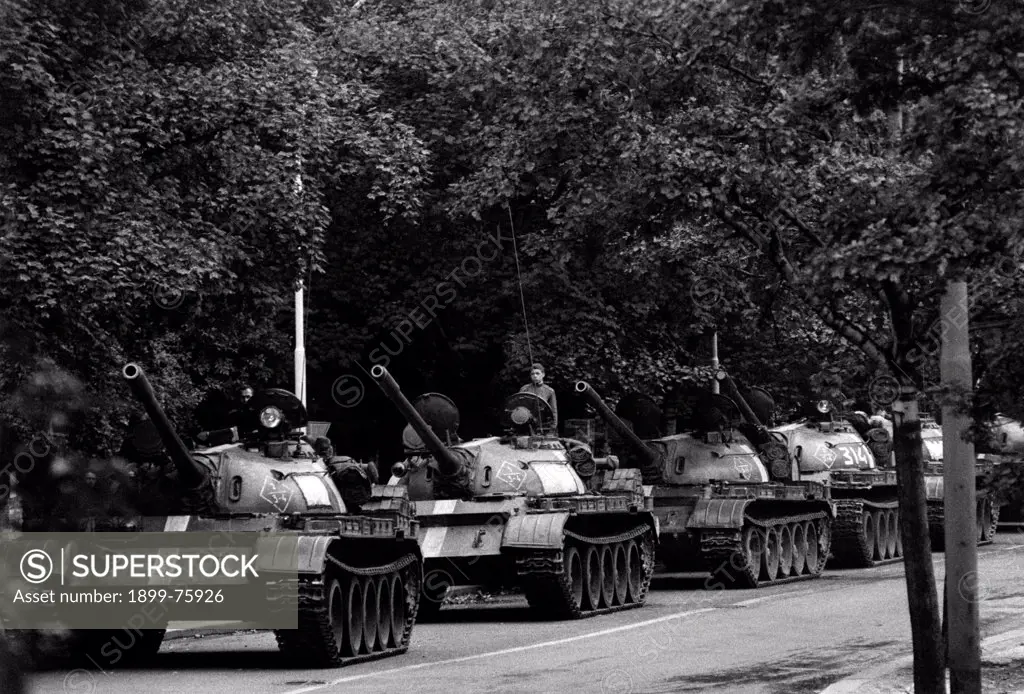 A column of Soviet tanks stopped in the Fucik park during the first day of the occupation. Prague, 21th August 1968