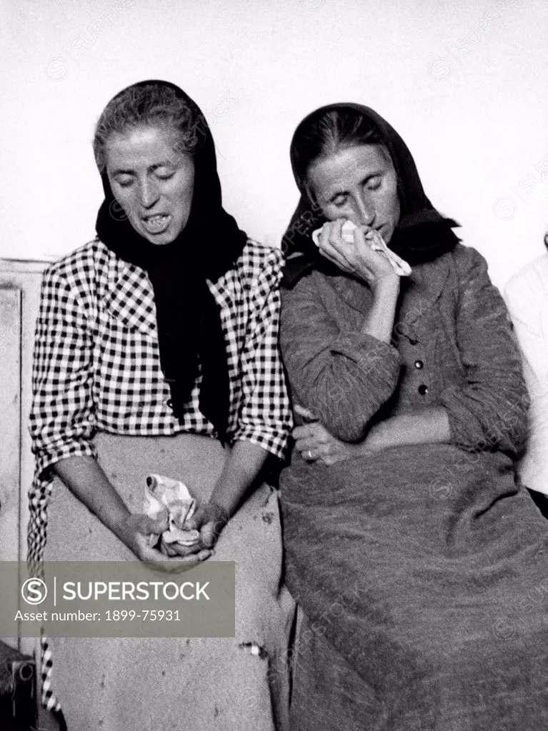 Two women relatives of some miners involved in the mine fire waiting for news about their relations. Marcinelle, Belgium, 19th August 1956