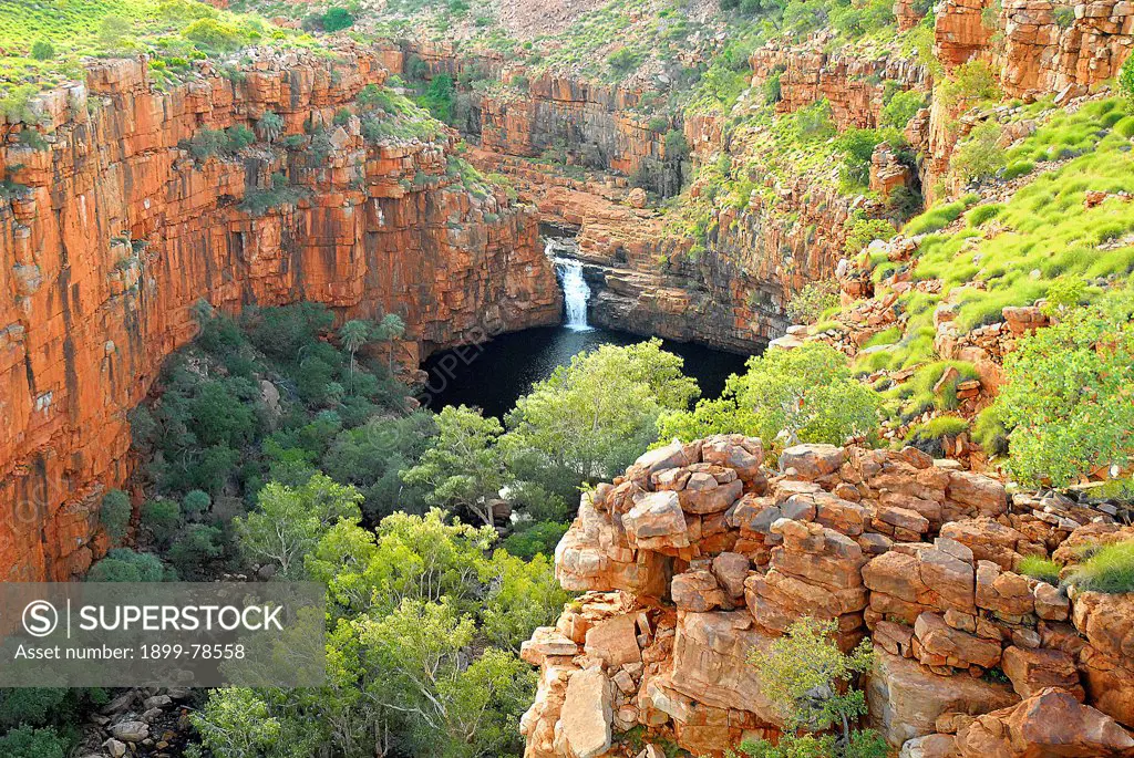 Wet season waterfall on Cowandyne Creek in its deeply incised gorge, King Leopold Ranges, Mornington Wildlife Sanctuary, central Kimberley, Western Australia