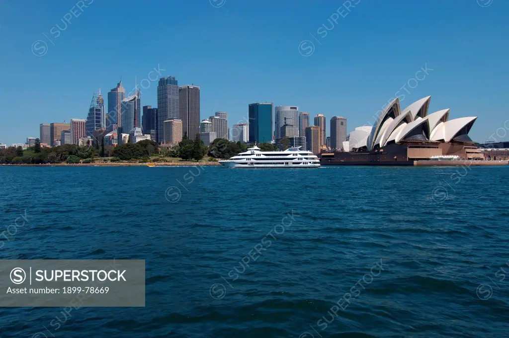 Sydney Opera House and city skyline from a Harbor ferry, Sydney, New South Wales, Australia