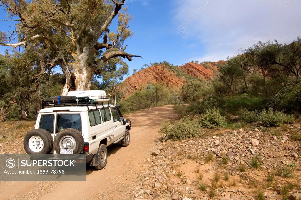 Four-wheel-drive vehicle on the Brachina Gorge Geological Trail, a driving tour moving forward through time Flinders Ranges, South Australia