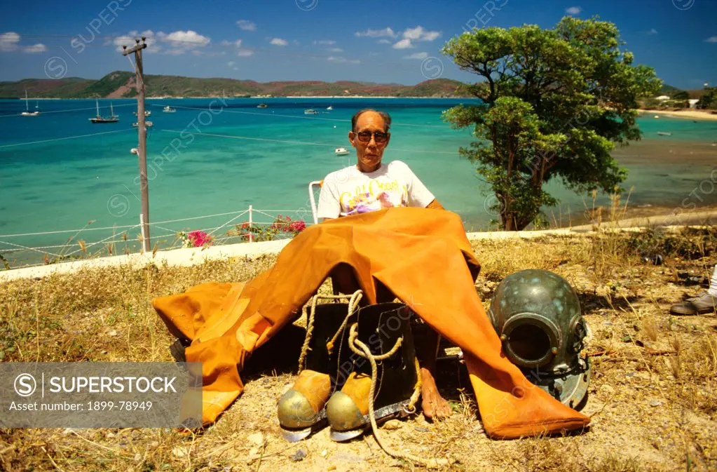 Tomitaro Fuji former pearl diver with some of his diving equipment, Thursday Island, Torres Strait Islands, Queensland, Australia