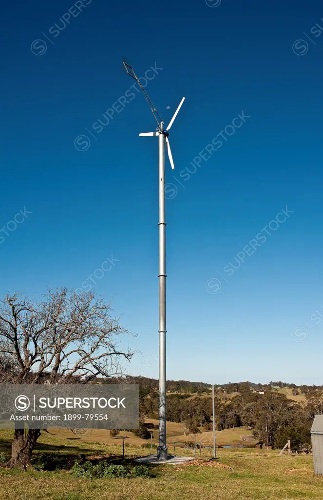 Small wind turbine on a farm, South coast New South Wales, Australia
