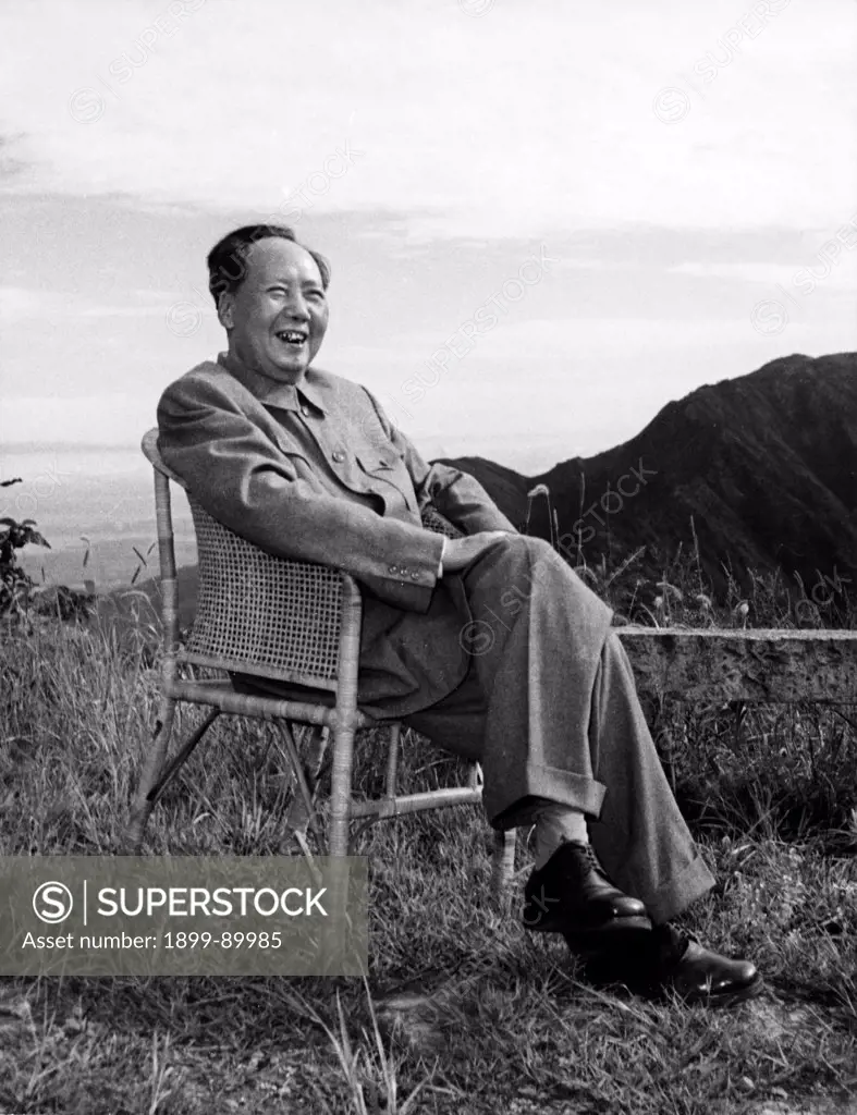 Mao Zedong, Chairman of the Central Committee of the Communist Party of China, sitting in a chair on a mountain. 1964.