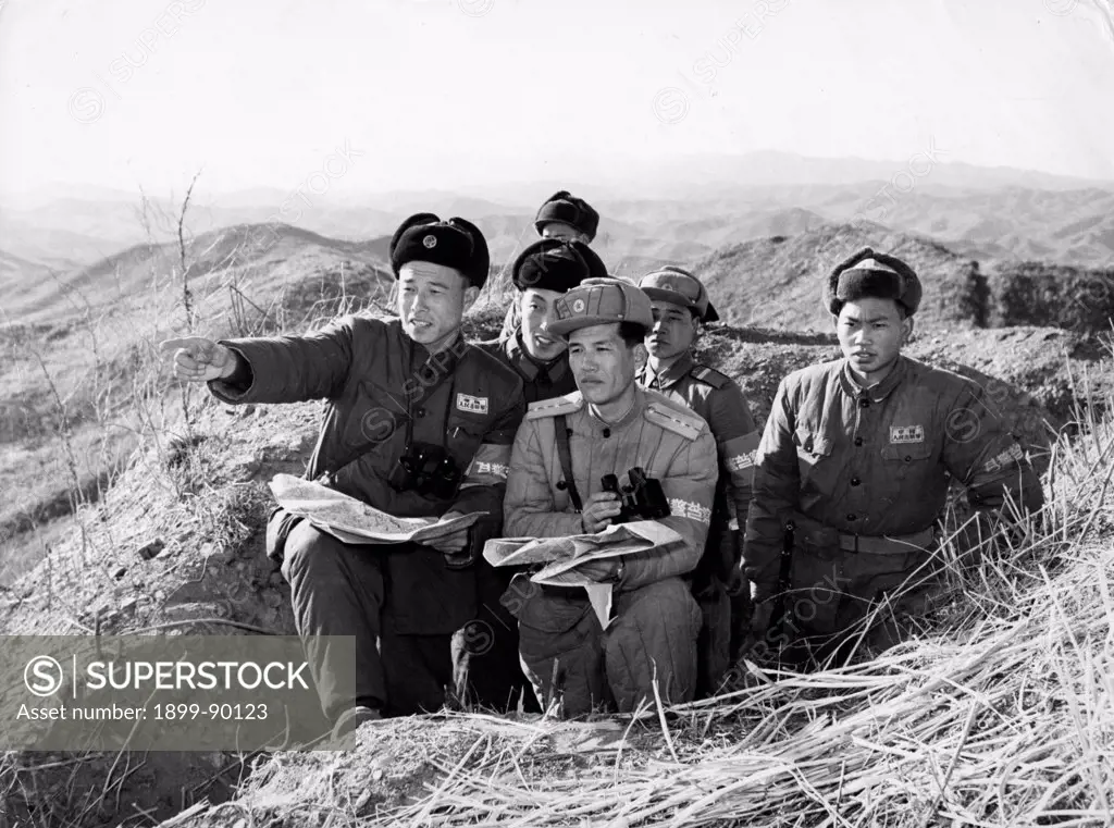 Korean War. Members of the Chinese People's Volunteers guarding Ma Lang San, transfer defense positions to the Korean People's Army. March 1958.