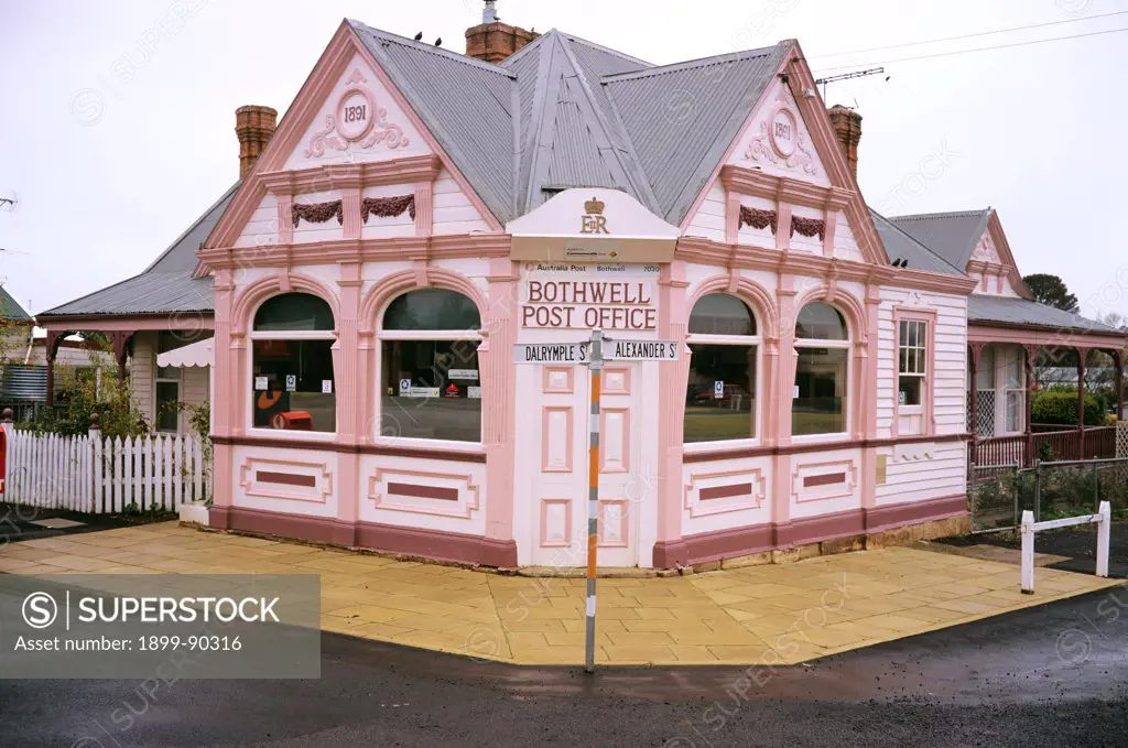 Former post office, built as a bank in 1891, the rail on the right is a hitching rail for customers who arrived on horseback, Bothwell, Central Highlands, Tasmania, Australia. 01/11/2004
