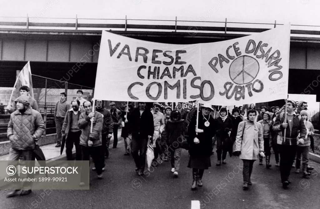 Pacifists in Milan marching towards Comiso, where the Sicilian Committees Assembly for peace and disarmament is held; the government has recently decided to instal NATO bases in the ex airport of the town. Italy, 1982.