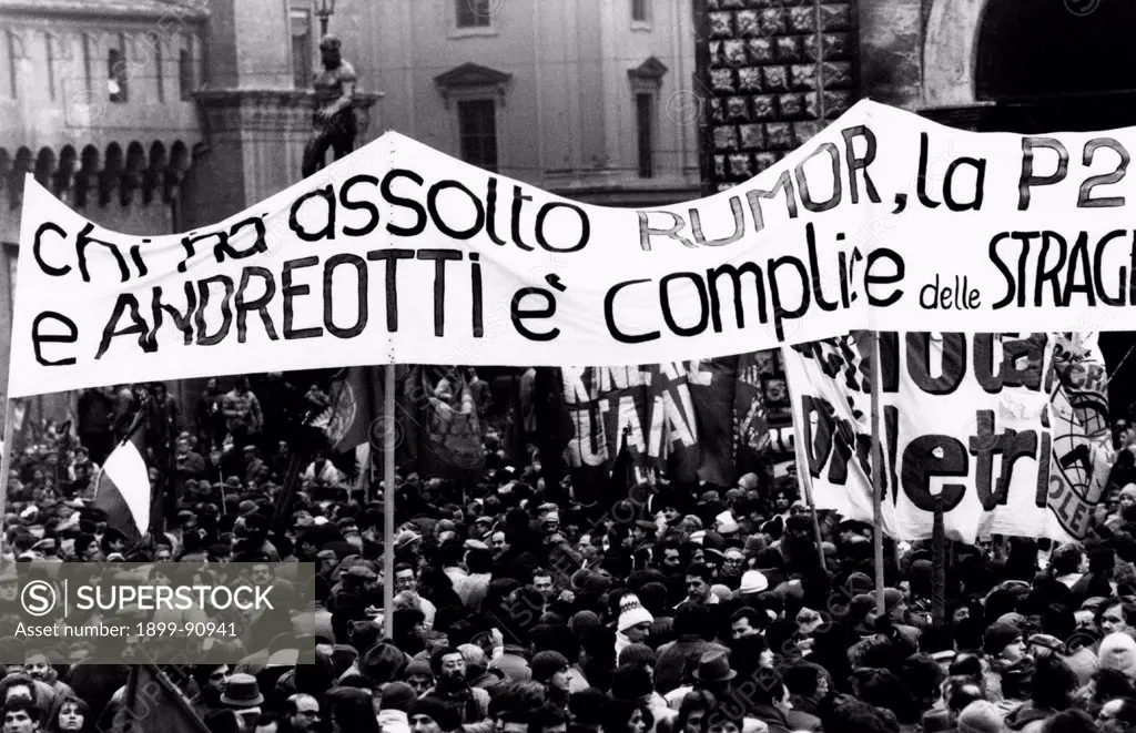 Demonstrators in a square protesting against the massacre of the Express Train 904 happened on 23rd December 1984 in the Great Gallery in the Apennines mountains; the Mafia was considered responsible for the attack. Bologna (Italy), 1984.