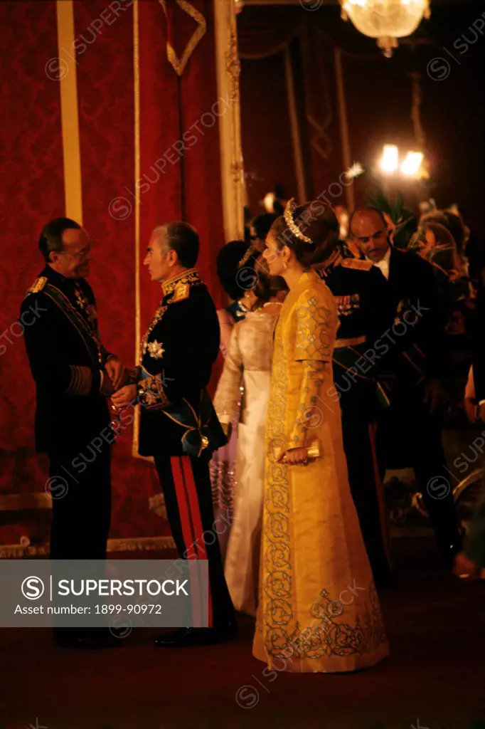The Shah of Persia, Mohammed Reza Pahlavi and his wife Farah Pahlavi greet Prince Bernhard of Holand during the celebration of the 2500th anniversary of the Persian Empire. Persepolis (Iran), October 1971.