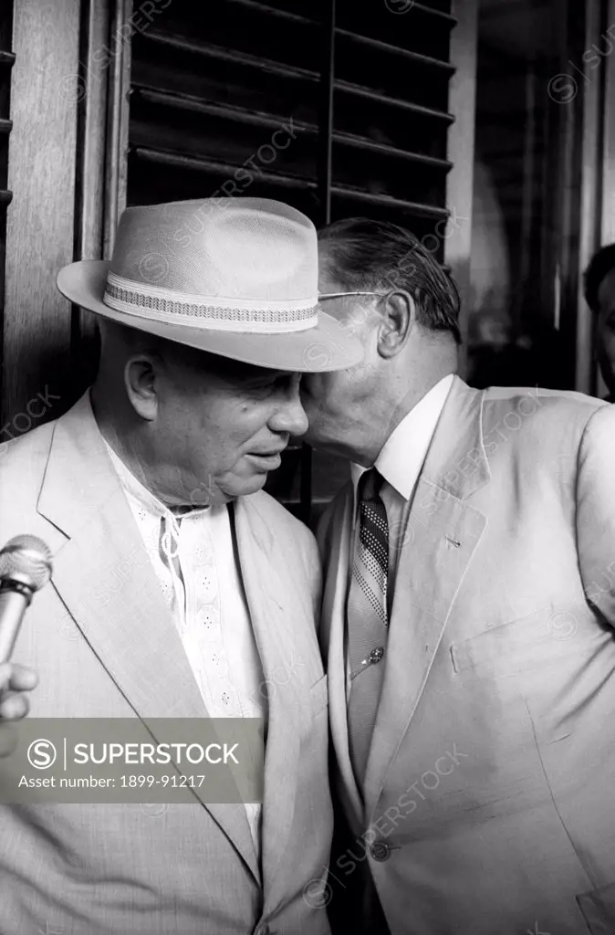 The Soviet political leader Nikita Khrushchev is listening to what the Yugoslav dictator Tito (Josip Broz Tito) is whispering in his ear during an interview, on the occasion of the visit of Khrushchev in Yugoslavia. Beograd (Yugoslavia, now Serbia), 1963.