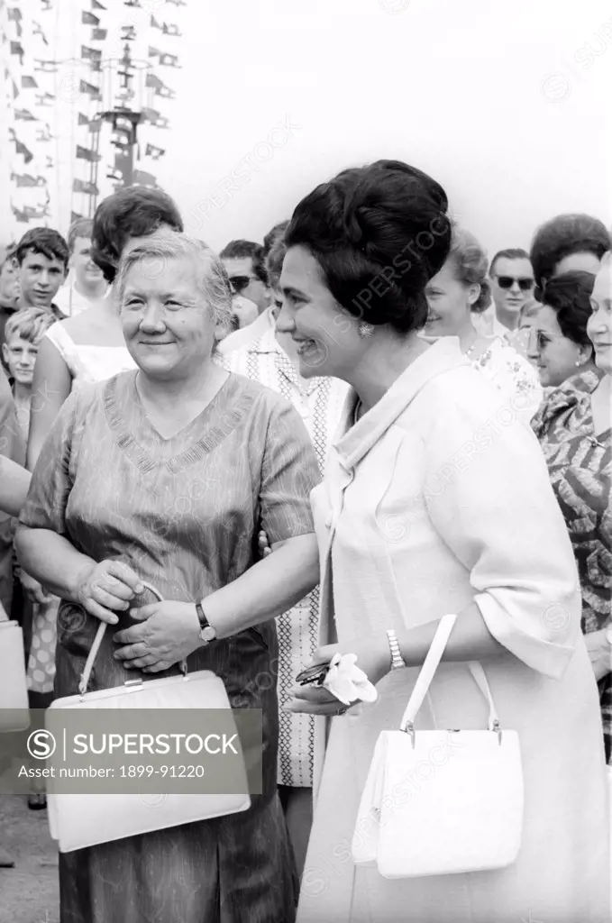 The Yugoslav First Lady, Jovanka Broz (the Yugoslav leader Tito's fourth wife since 1952), and Nina Khrushchev, the Soviet leader Nikita Khrushchev's wife, are chatting on the occasion of a tour in Beograd of the Soviet political leader. Beograd (Yugoslavia, now Serbia), 1963.