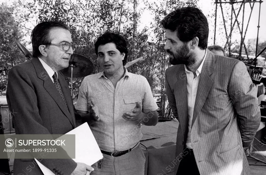 Italian journalist and member of the Parliament Giulio Andreotti talking with Italian politician Roberto Formigoni and another member of the Christian Democratic Party (DC). Milan, 3rd July 1983