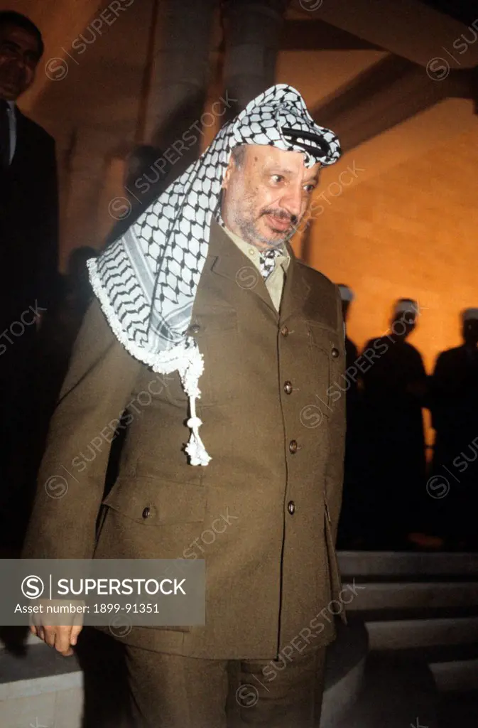 Portrait of Palestinian politician and President of the Palestine Liberation Organization Yasser Arafat wearing a keffiyeh. 1980s