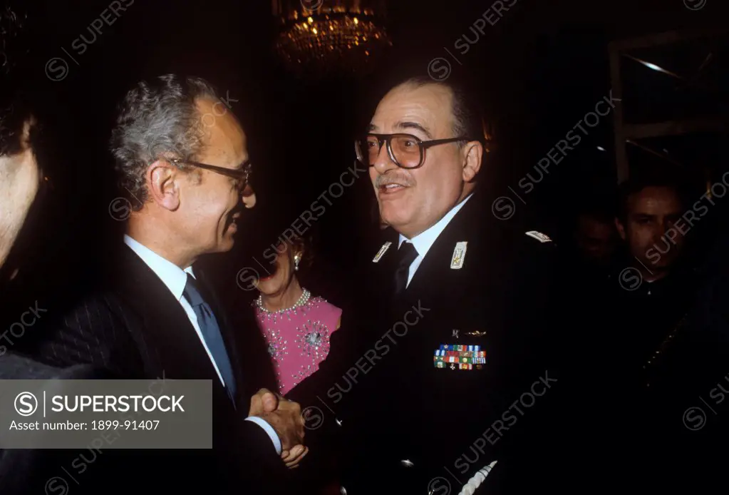 Italian general and Prefect Carlo Alberto Dalla Chiesa shaking hands with Italian minister of Interior of the Italian Republic Virginio Rognoni. Italy, 1970s