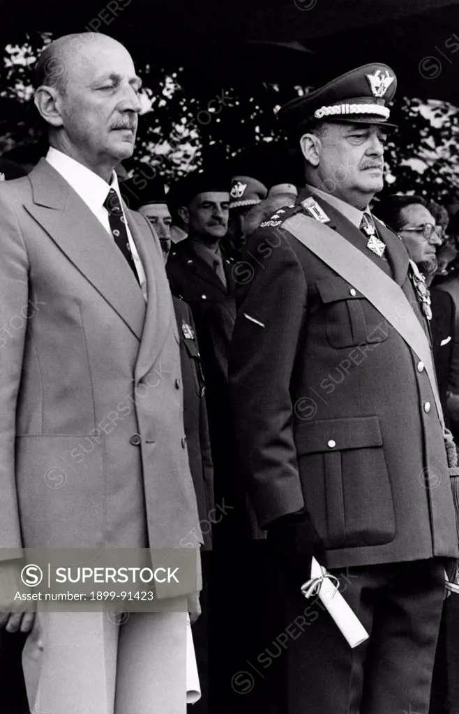 Italian general and Prefect Carlo Alberto Dalla Chiesa attending a commemoration ceremony with the Attorney General of the Italian Republic of Milan Mauro Gresti. Italy, 1980s