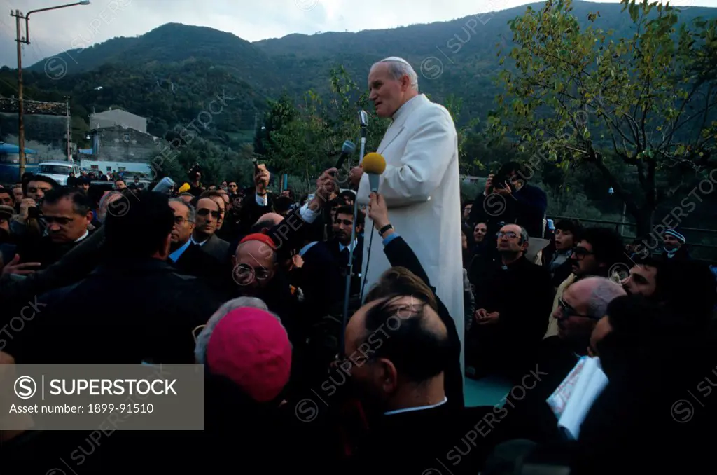 The Polish pope John Paul II (Karol Wojtyla) speaking to a crowd of believers during his visit to the village hit by the earthquake. Balvano, 1980