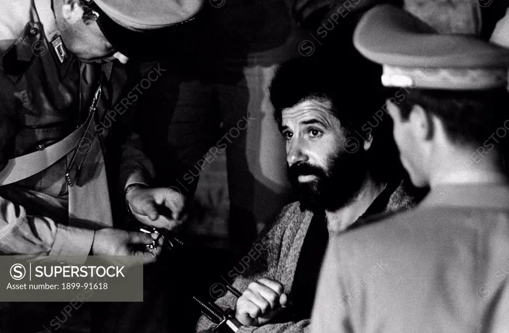 Italian terrorist Renato Curcio, founder and ideologist of the left-wing terrorist group Red Brigades, sitting handcuffed during the trial at the Corte d'Assise. Renato Curcio is charged with organization of an armed group targeting the violent suppressing of legal, economic and political systems of Italian State. Milan, June 1977