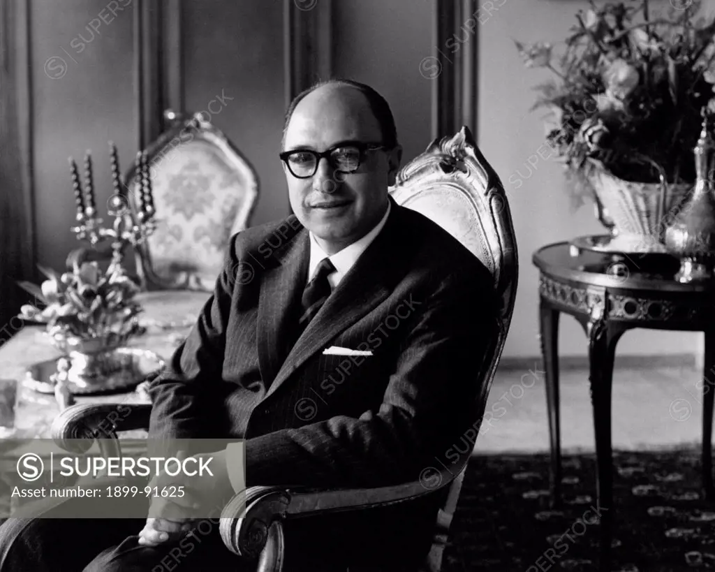 Italian lawyer and Christian Democrat deputy Danilo De' Cocci sitting in an armchair. 1963