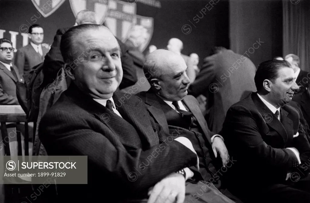 Italian politician of the Christian Democratic Party Giuseppe Pella smiling sitting beside Prime Minister of Italy Amintore Fanfani at Teatro San Carlo on the occasion of the 8th national congress of the Christian Democratic Party, sanctioning the openness of the party to the left. Naples, January 1962